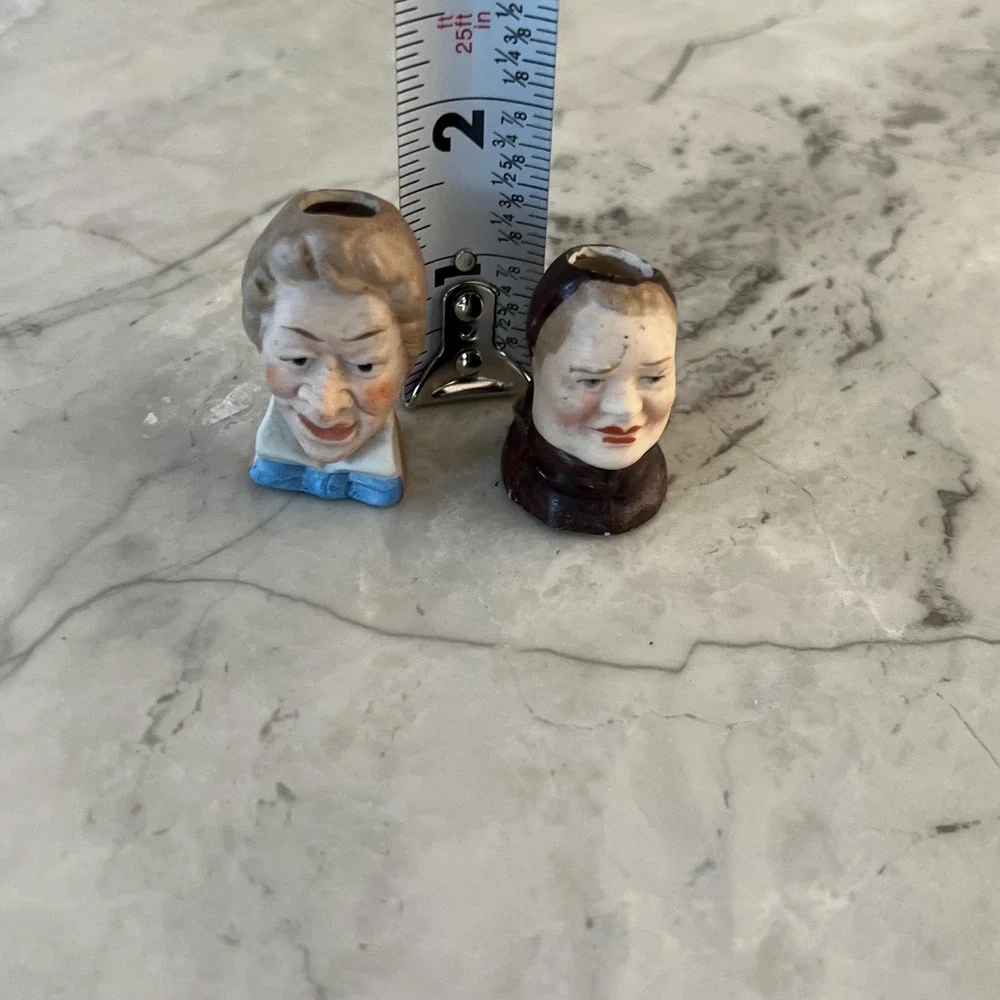 Pair of antique small figuring heads - perfect for candlestick or‎ salt